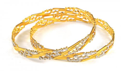 two gold bangles